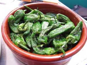 Pimientos de Padrón! (Available at most tapas bars...just padrón peppers pan-fried in olive oil and sprinked with sea salt--yum)